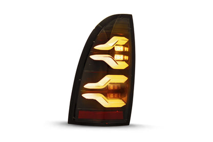 ARex Luxx LED Tails: Toyota Tacoma (05-15)(Black-Red)